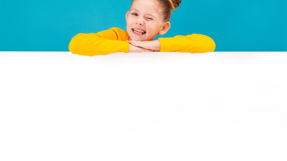 test-images/cute-little-red-haired-girl-yellow-pullover.jpg